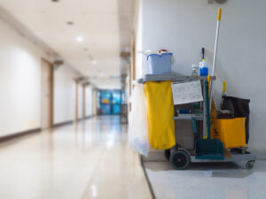 A cleaning cart in the hallway of an El Paso business.