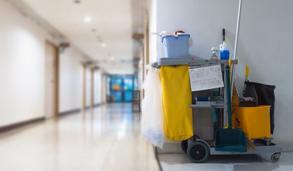 A cleaning cart in the hallway of an El Paso business.